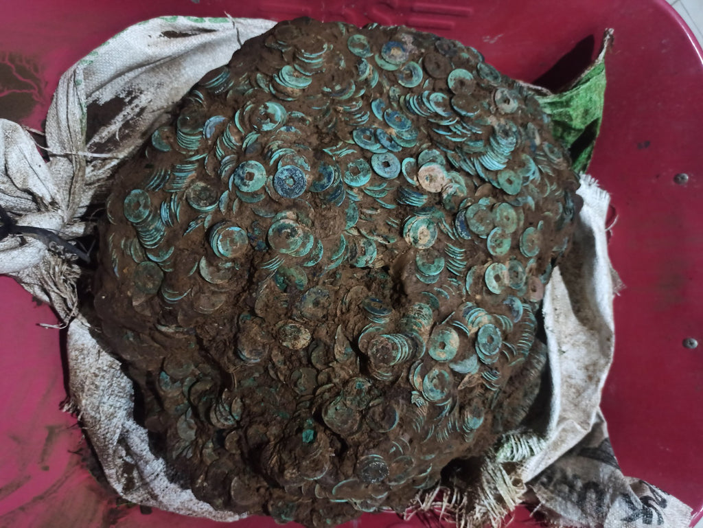 A lump of chinese coin fossil