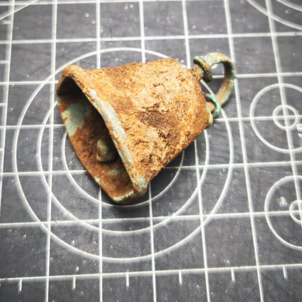 Bronze covered bell with hexagram shape