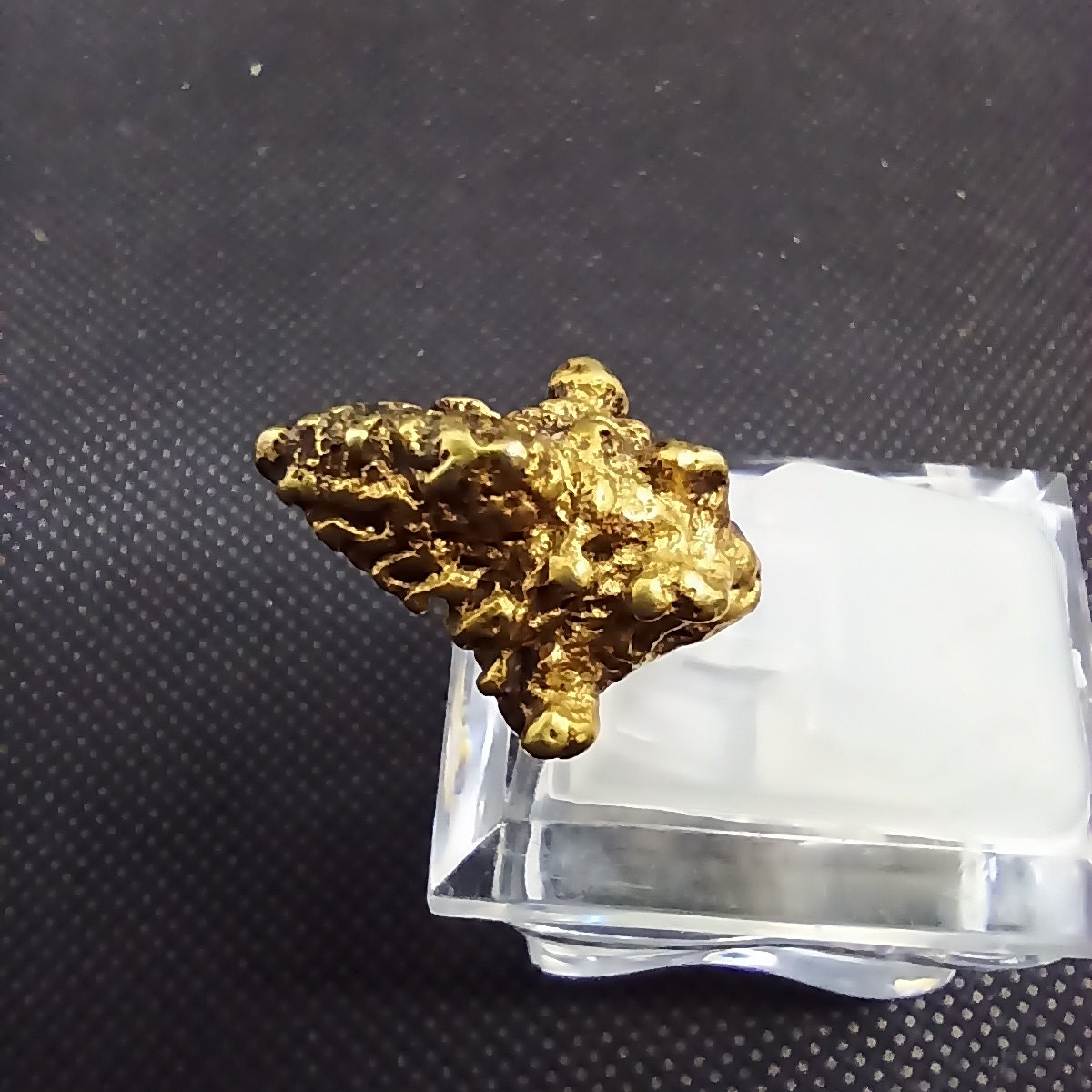 Ancient Javanese Gold Earpiece figurine side view