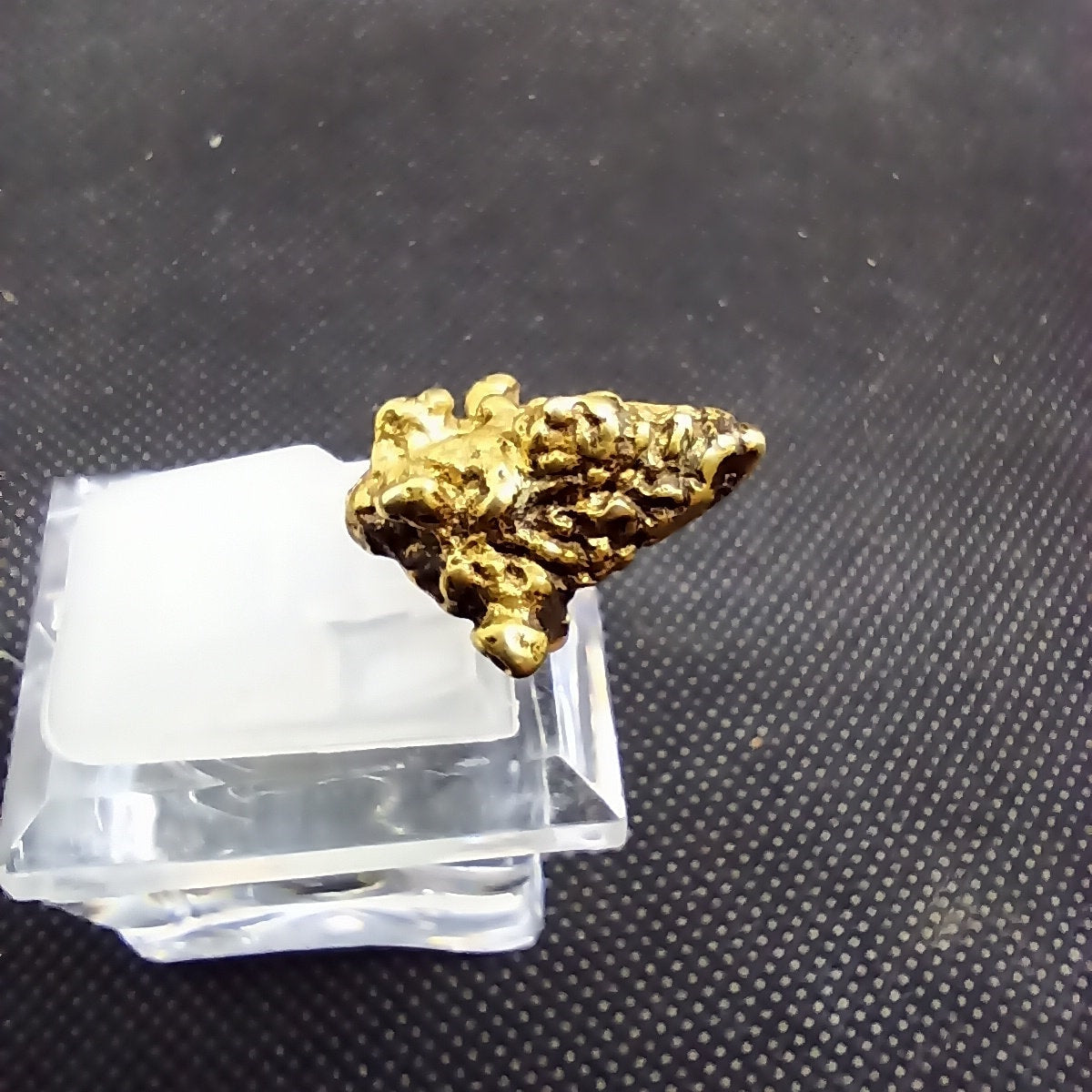 Ancient Javanese Gold Earpiece figurine side view