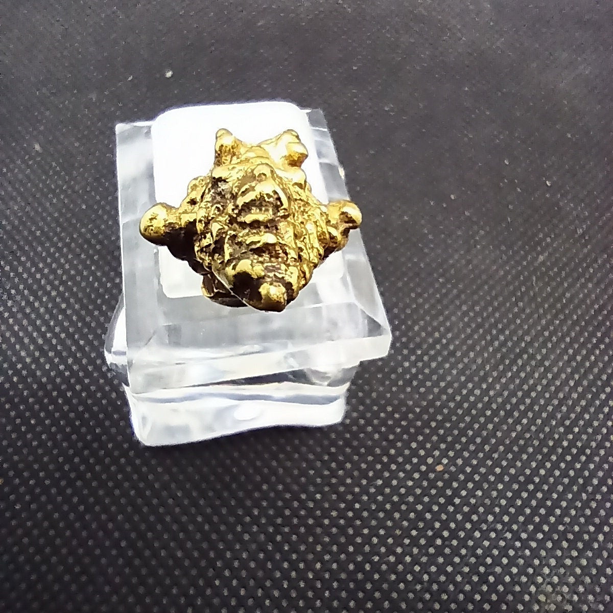 Ancient Javanese Gold Earpiece figurine top view